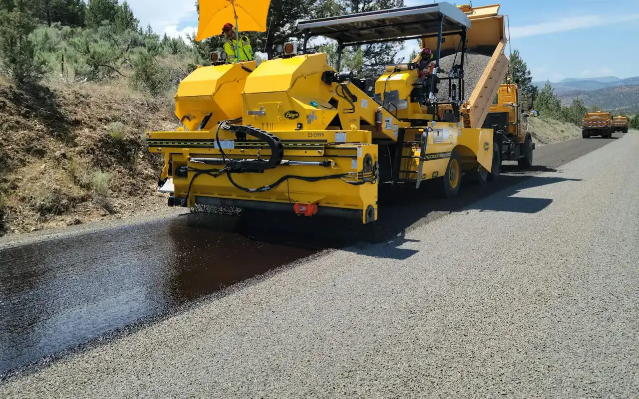 Asphalt paver laying a new road surface